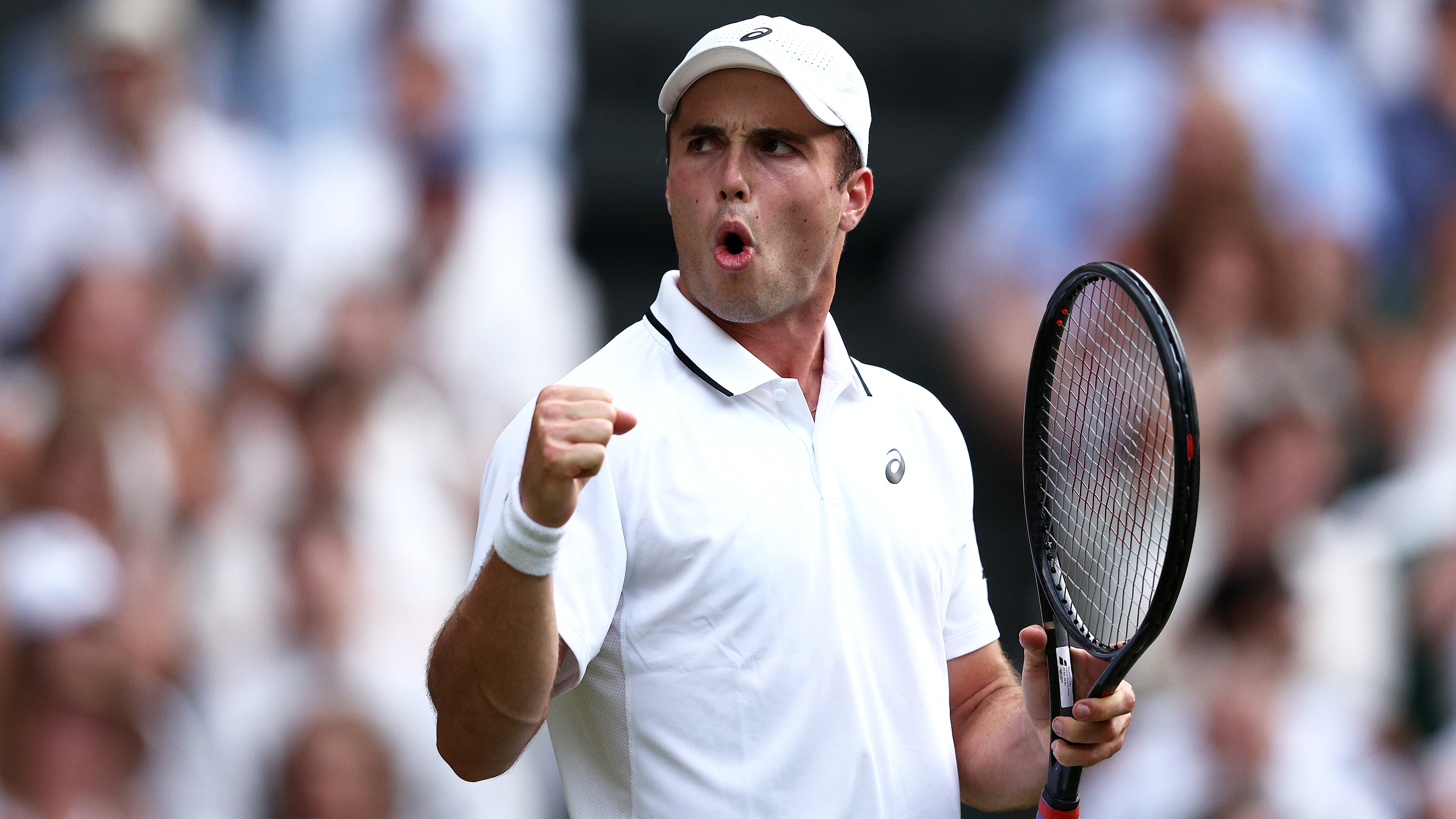 Arthur Fery of Great Britain celebrates against Grigor Dimitrov of Bulgaria during their Gentlemen's Singles fourth round match on day eight of The Championships Wimbledon 2026