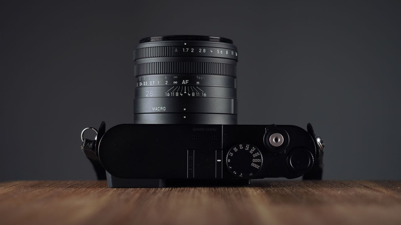 Leica Q3 Monochrom on a wooden surface