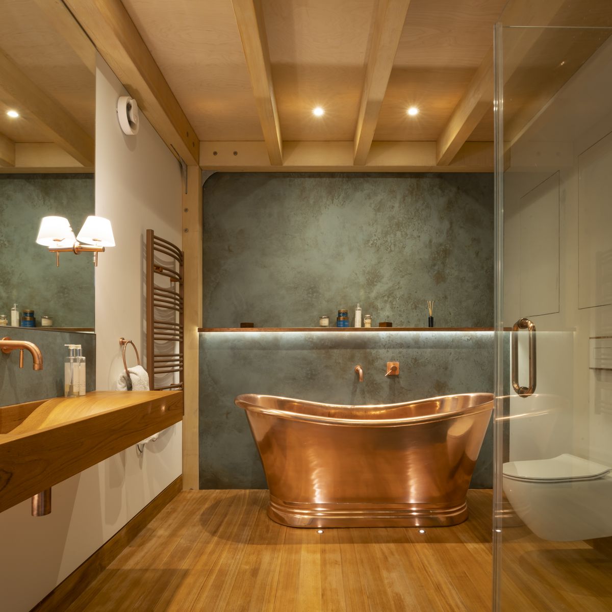Lizzie and Tristan&rsquo;s solution to the lack of natural light on the lower-ground floor was to create a spa-like bathroom with a clever lighting plan to compensate.