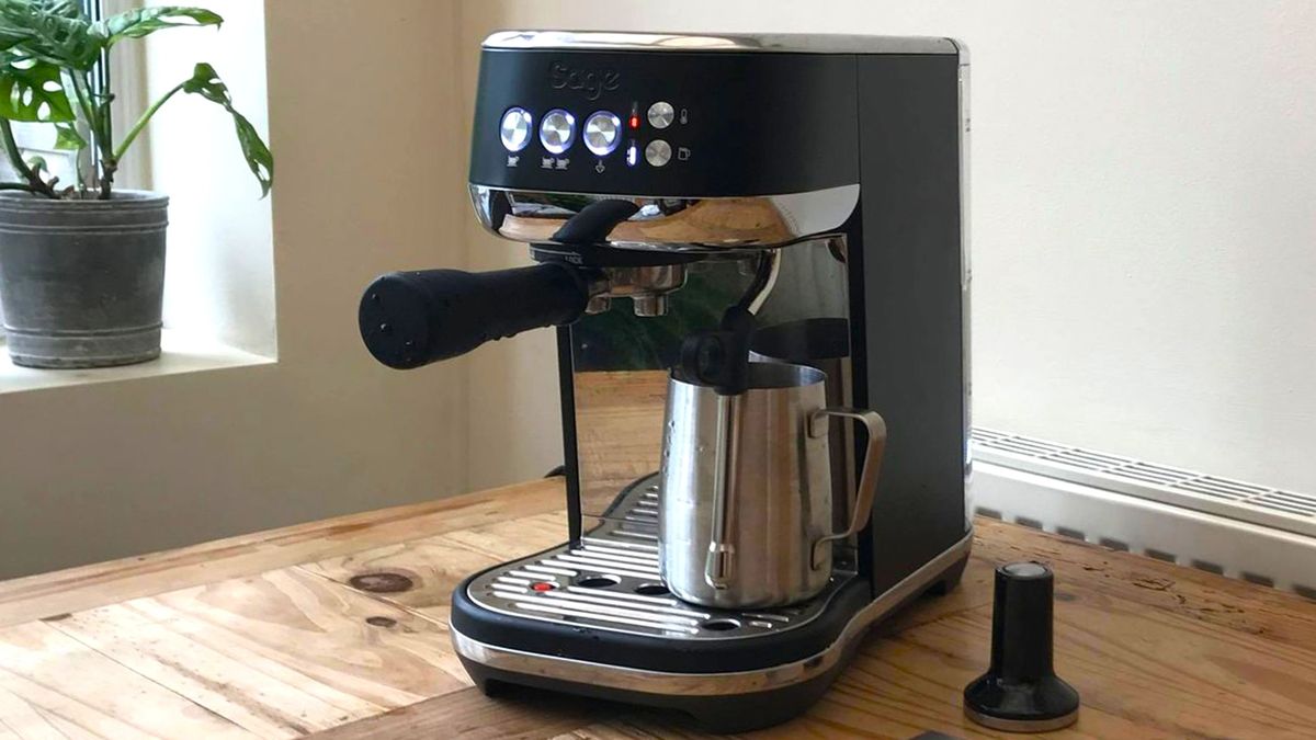 Breville Bambino Plus coffee maker on kitchen counter