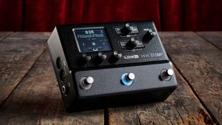 A Line 6 HX Stomp on a wooden floor