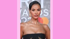 Maya Jama attends The BRIT Awards 2023 at The O2 Arena on February 11, 2023 in London, England./ in a purple/pink template