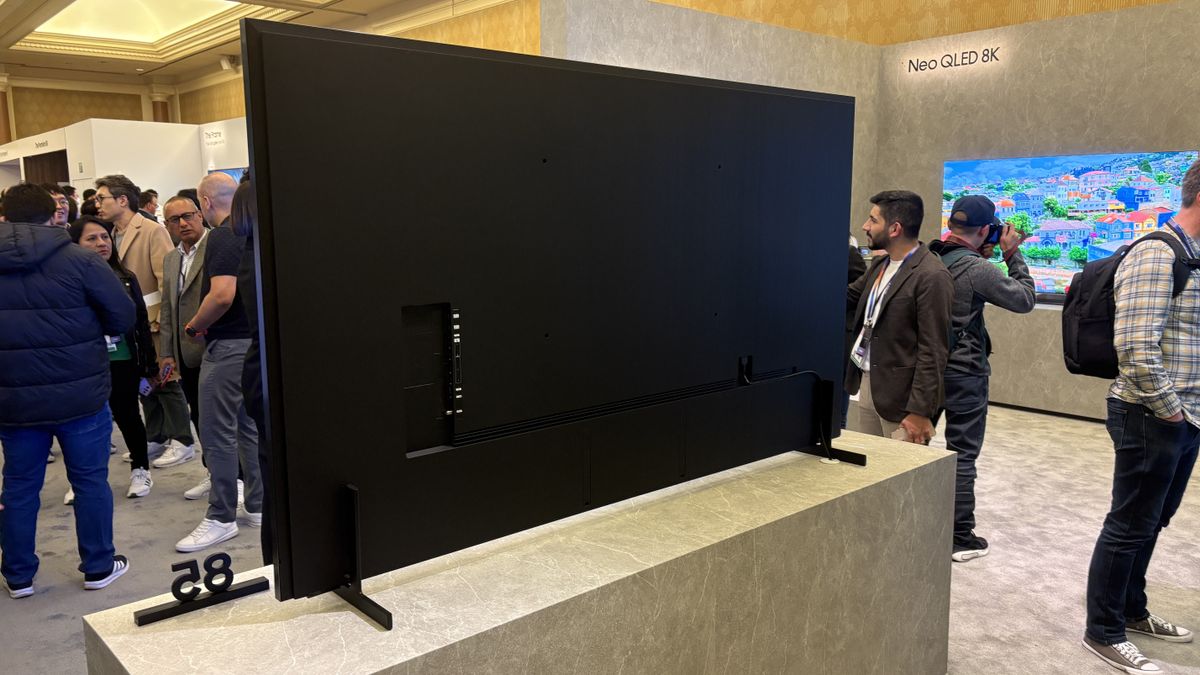 Samsung Q900F TV on a white stand at Samsung's CES 2025 showcase