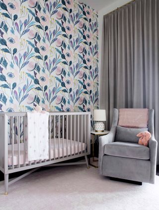 Nursery with floral wallpaper