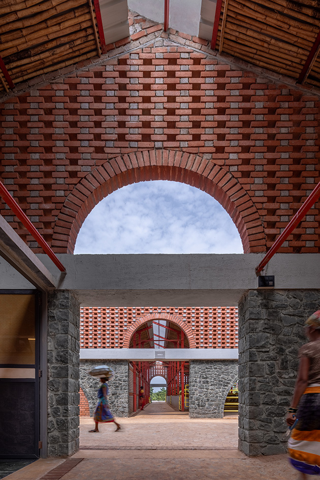 Gaugram , a cow shelter with pitched roofs and brick structure