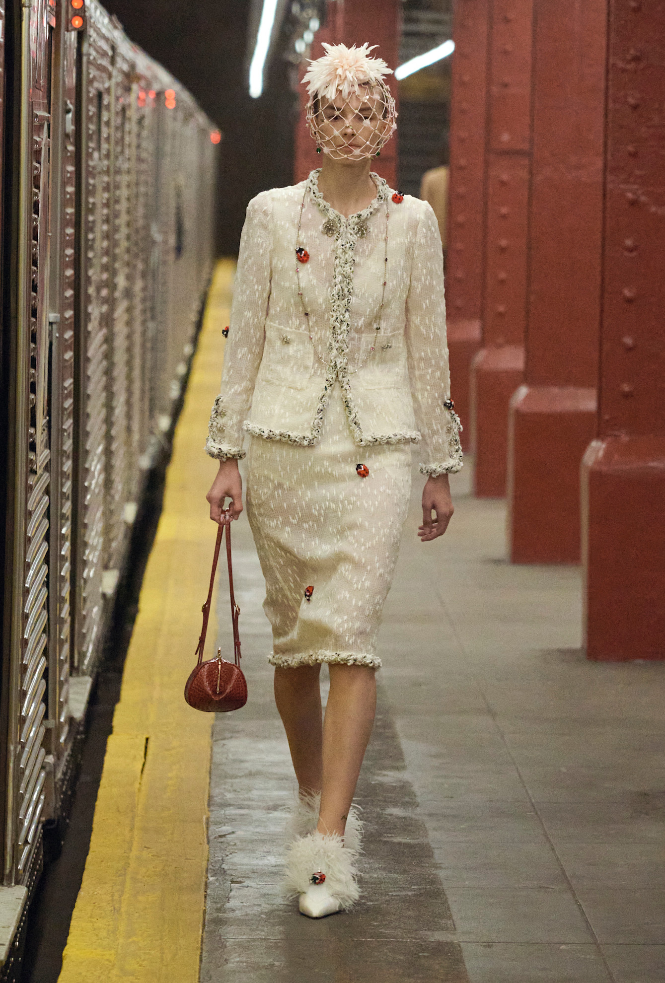 models walk the subway runway for the chanel metiers d'art 2026 show in new york city