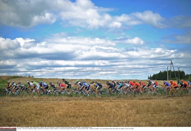 The peloton passed through a rural setting