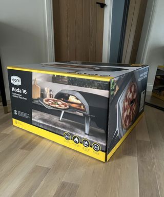 pizza oven in its boxed packaging