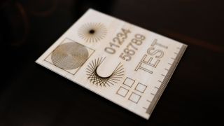 The wecreat vista laser cutter/engraver results on plywood, showing good accuracy.