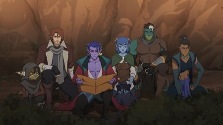 Mollymauk looking at a map as the rest of The Mighty Nein sit around him in the Prime Video show's sixth episode