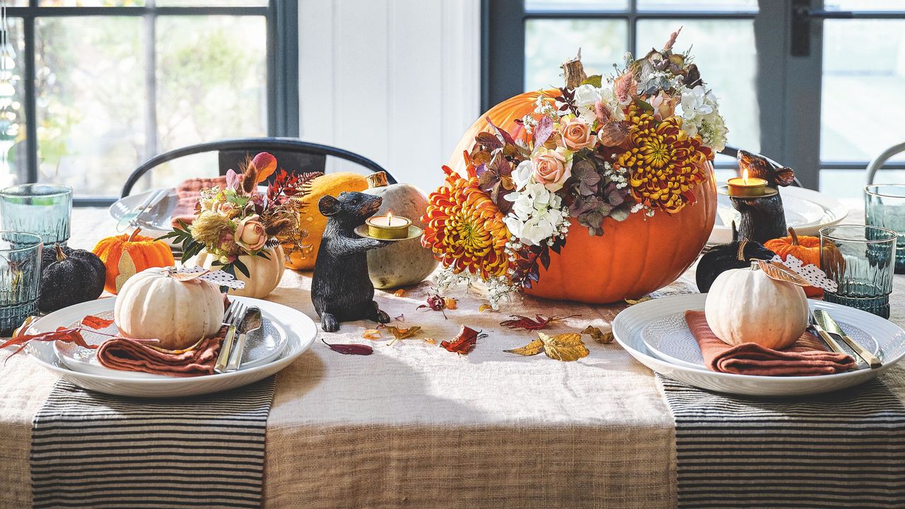 autumn decorating ideas table with pumpkins and flowers