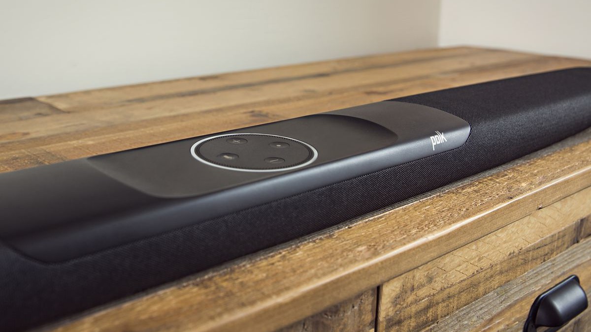 a close up of the Polk Audio Command Bar on a wooden cabinet