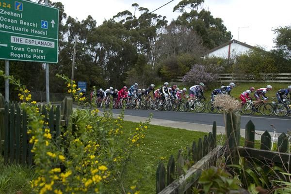 The field in the 2010 Caterpillar Underground Mining Tour of Tasmania climb out of Strahan during the stage one criterium.