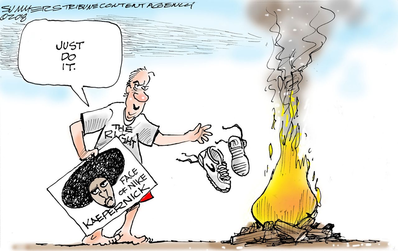 Editorial cartoon U.S. Nike Colin Kaepernick campaign burning shoes right wing protest