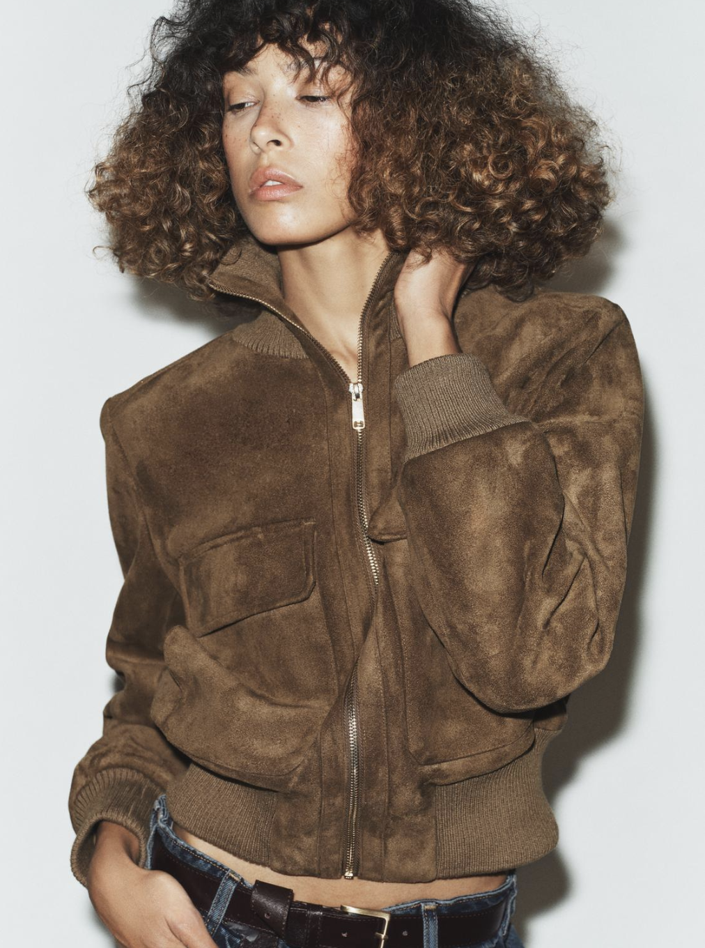 Model wears Zara Spring Fashion Trends 2026. She wears a bomber jacket.