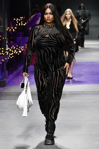 Precious Lee walks the runway at Versace