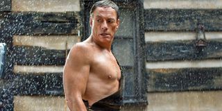 Jean-Claude Van Damme stands in the rain in a scene from Jean-Claude Van Johnson