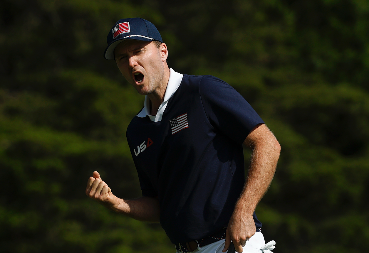 Russell Henley celebrates holing a putt at the 2025 Ryder Cup