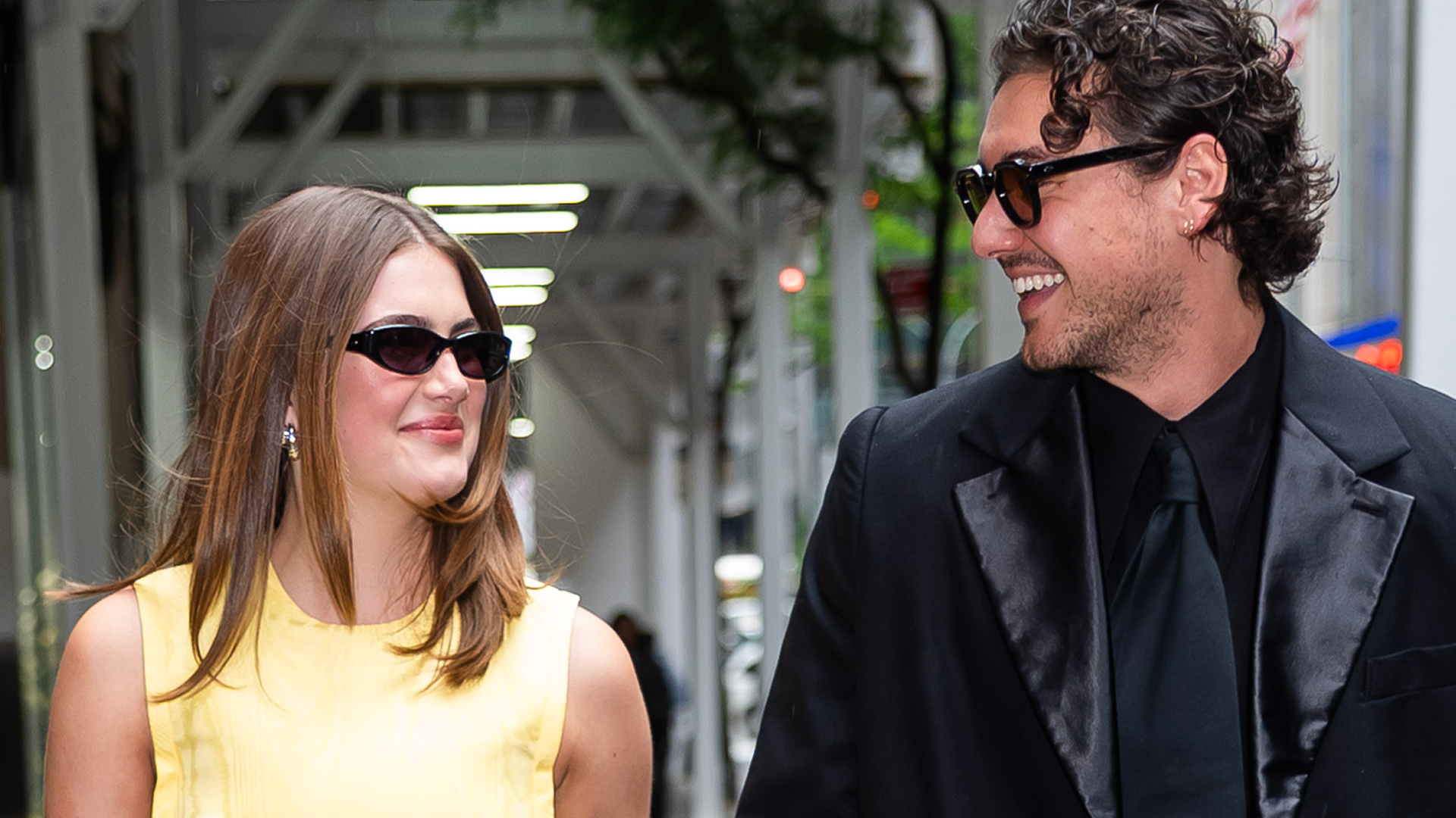 Ella Bright styled a little yellow dress with patent black pumps and a matching top-handle bag