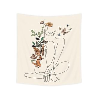 A wall tapestry with line art of a woman with flowers and butterflies