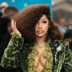 Cardi B wearing a green dress at the 2025 met gala