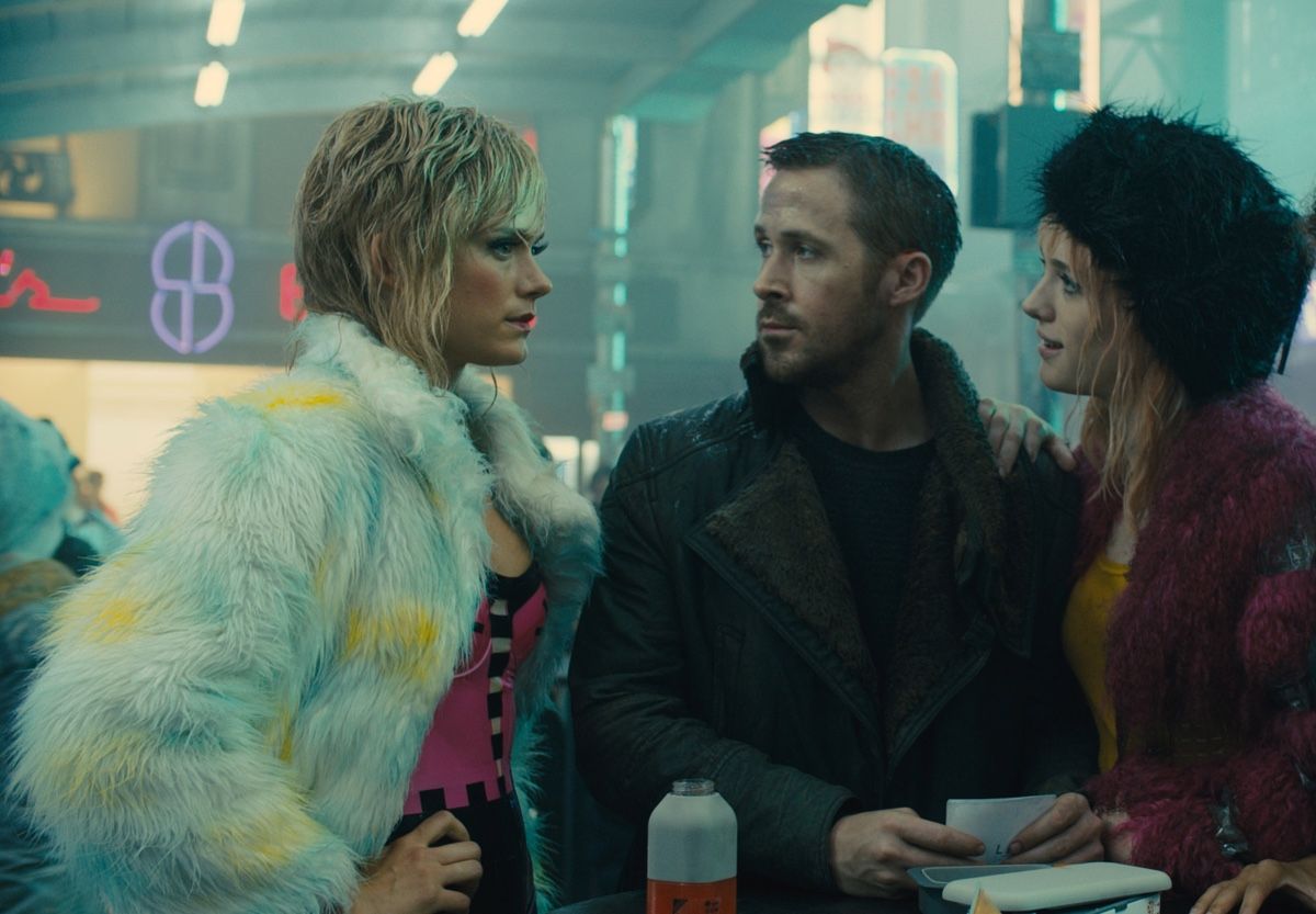 Krista Kosenen as Doxie #2, Ryan Gosling as K and Mackenzie Davis as Mariette in &quot;Blade Runner 2049.)