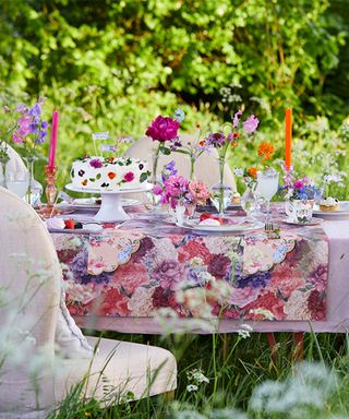 Garden party ideas with floral tablecloth tableware and cakestand