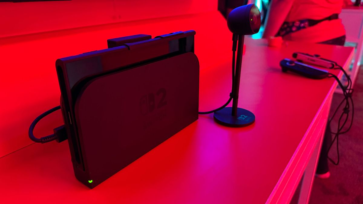 Nintendo Switch 2 in dock with camera.