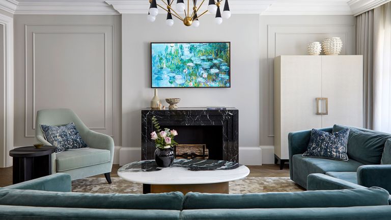 Mayfair apartment living room with green sofa and armchair