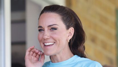 Kate Middleton’s gold hoops seen during her visit to Maidenhead Rugby Club