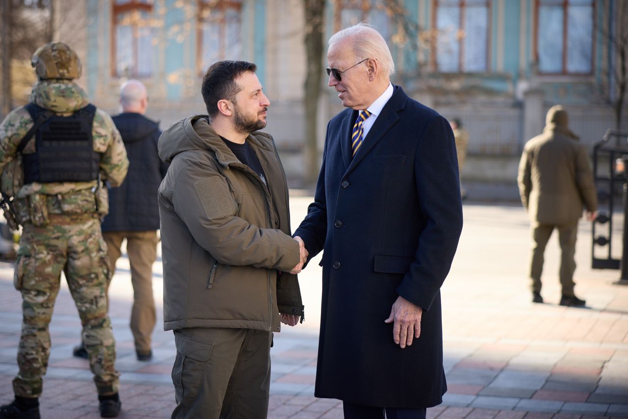 Presidents Zelenskyy and Biden shake hands