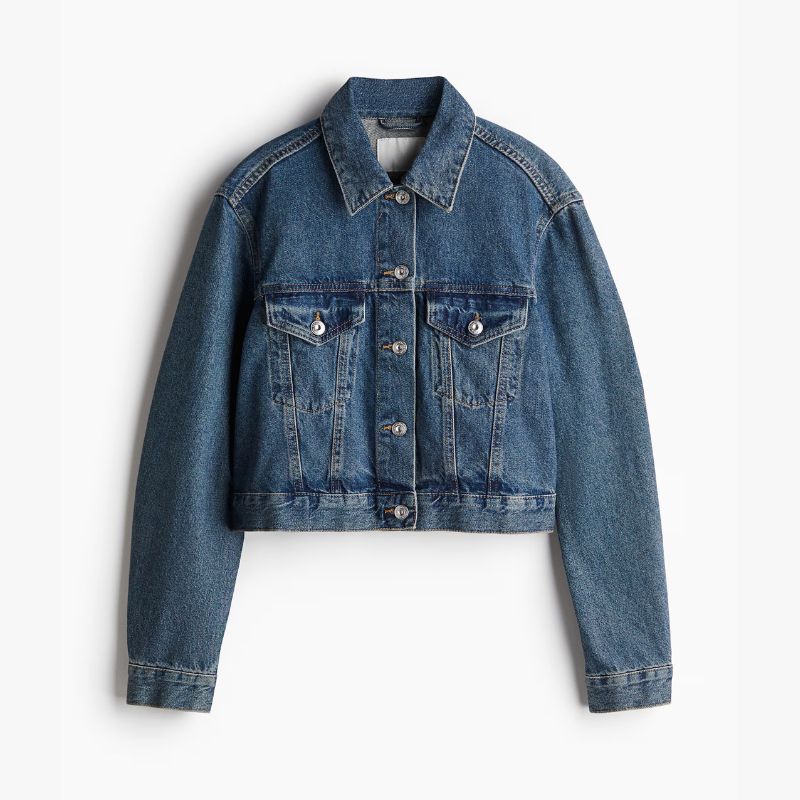 A cut out of a slightly cropped dark wash denim jacket from H&M