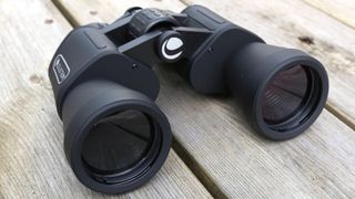 Image shows the objective lenses of the Celestron UpClose G2 10x50 binoculars.