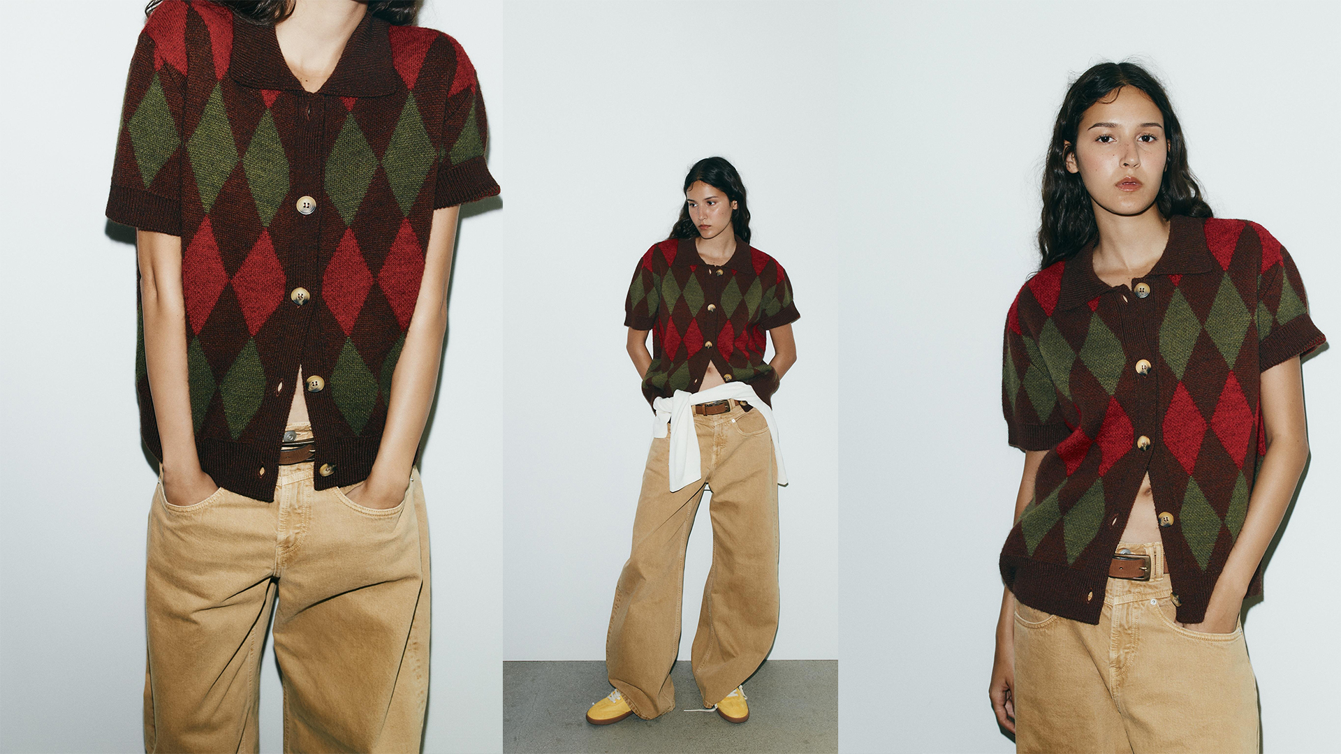 model wears short sleeved argyle sweater and brown jeans.