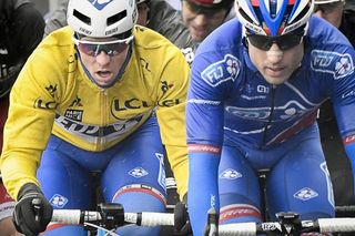 Arnaud Demare (FDJ), wearing the overall leader's yellow jersey,