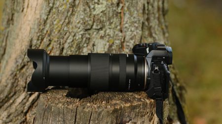 The Nikon mount version of the Tamron 18-300mm f/3.5-6.3 lens photographed outdoors