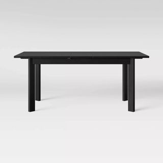 Target Bombelli Extendable Dining Table against a white background.