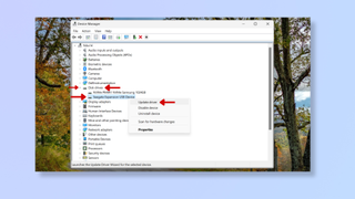 A screenshot of the Device Manager tool on Windows, with red arrows pointing at Disk drives and Update driver. 