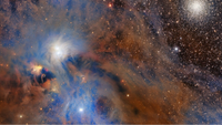 a colorful cloud of gas next to twinkling stars, in space