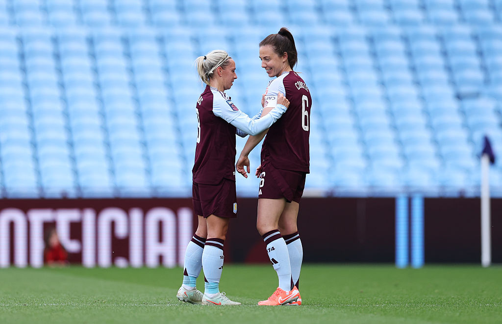Jordan Nobbs handing Rachel Corsie the Aston Villa captain armband