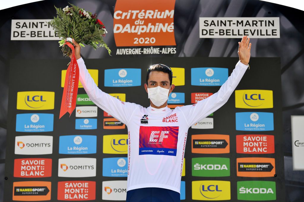 SAINT MARTIN DE BELLEVILLE FRANCE AUGUST 14 Podium Daniel Felipe Martinez Poveda of Colombia and Team EF Education First White Best Young Jersey Celebration Covid safety measures Flowers during the 72nd Criterium du Dauphine 2020 Stage 3 a 157km stage from Corenc to Saint Martin de Belleville 1419m dauphine Dauphin on August 14 2020 in Saint Martin de Belleville France Photo by Justin SetterfieldGetty Images
