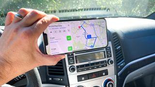 Apple Maps route in iOS 15 on a iPhone 13 Pro Max inside a car