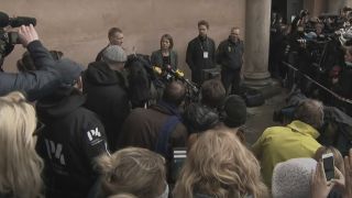 A press conference in Undercurrent: The Disappearance of Kim Wall