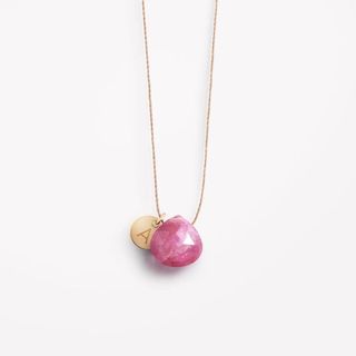 Pink sapphire and initial birthstone necklace.