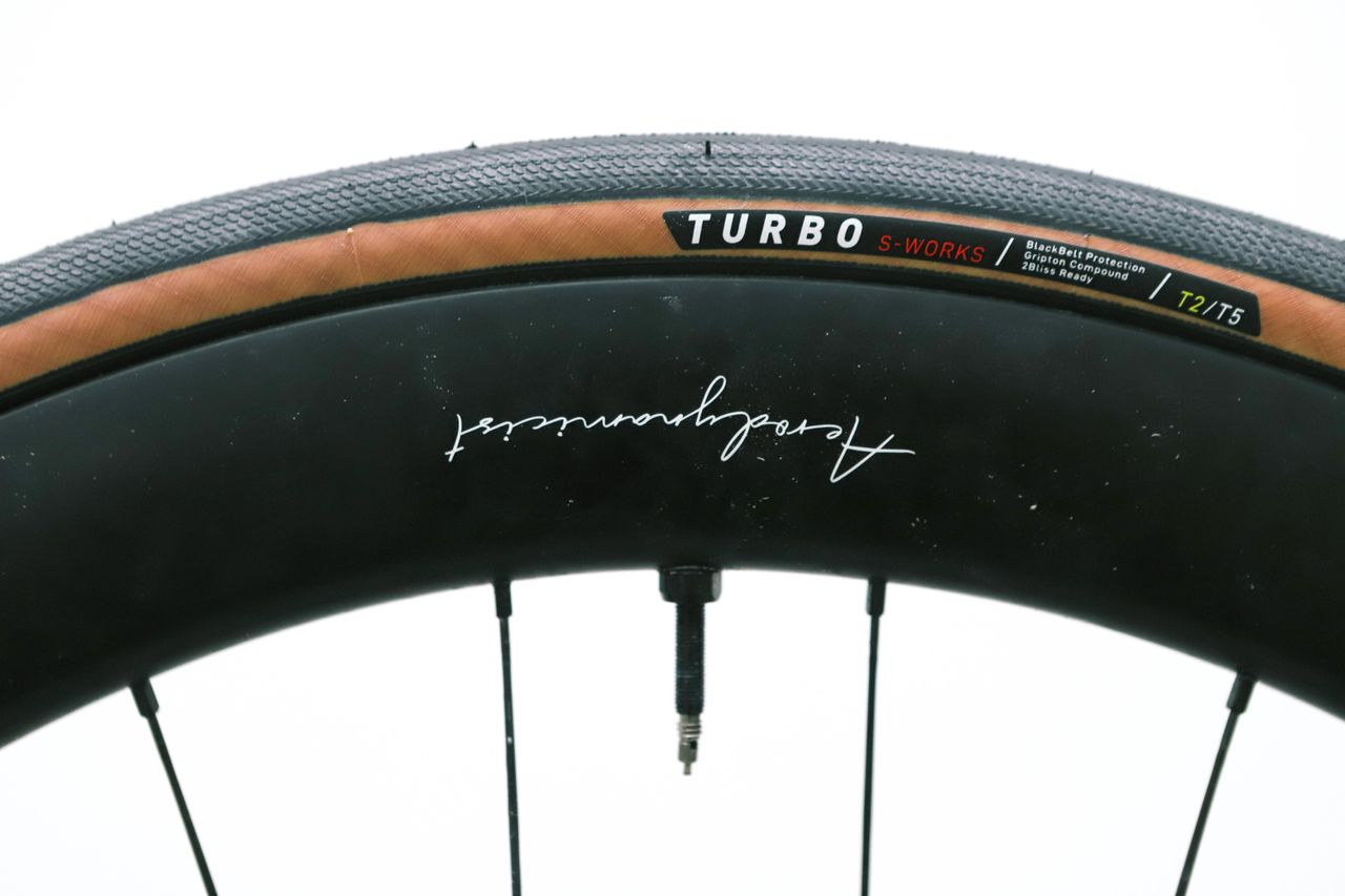A tan bicycle tyre on a white background
