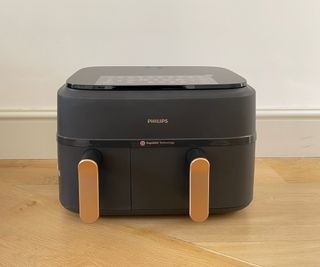 Philips 3000 Series Dual Basket unboxed on a wooden surface