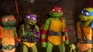 (L to R) Michelangelo, Donatello, Raphael and Leonardo look confused in Teenage Mutant Ninja Turtles: Mutant Mayhem