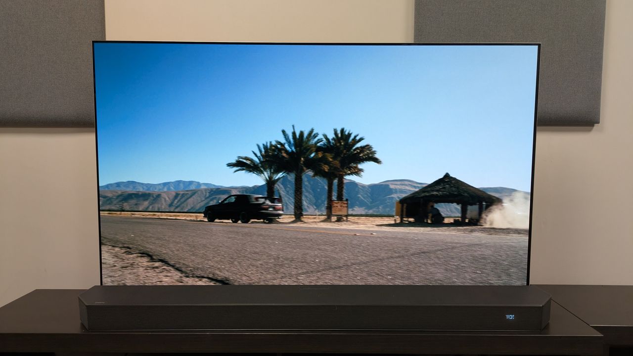 One Battle After Another 4K Blu-ray on LG G5, showing car driving away during a clear day. Picture shows bold colors of the blue sky