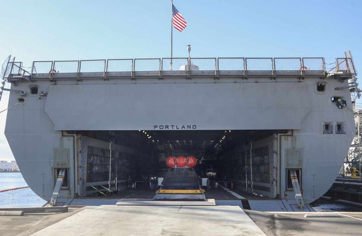 Orion in the bay of the USS Portland.