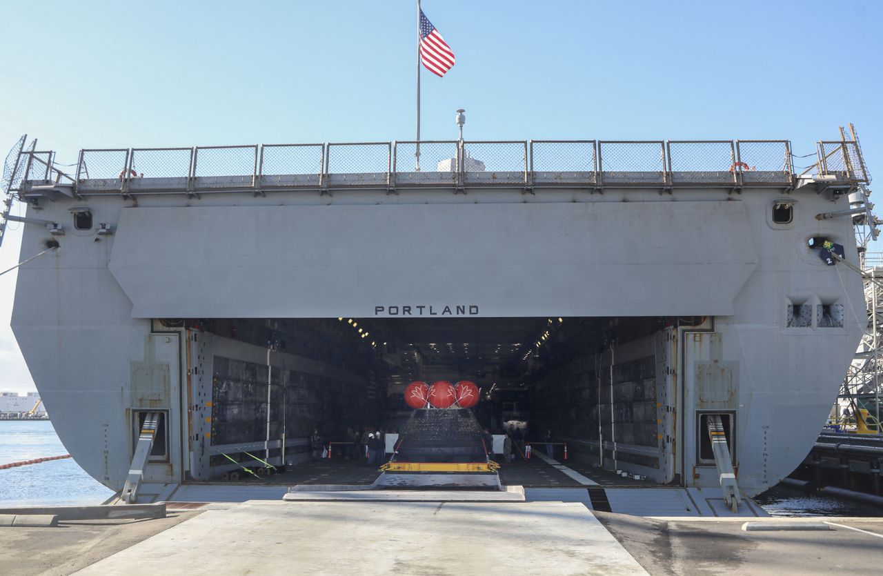 Orion in the bay of the USS Portland.